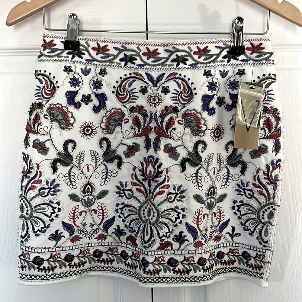 White embroidered mini skirt in size medium.